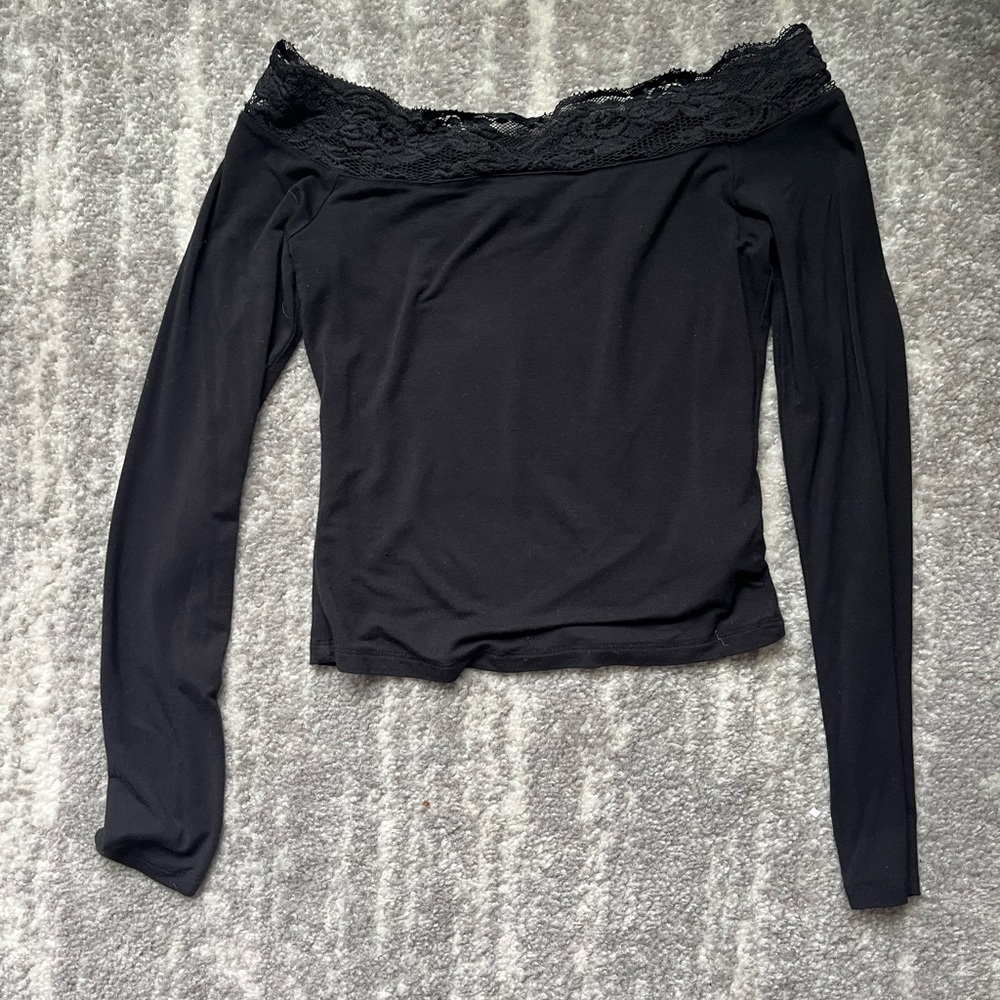Lacy off the shoulder black skinny top